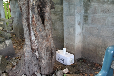 A bait station placed on the grounds of the Museum of Nevis History in Charlestown