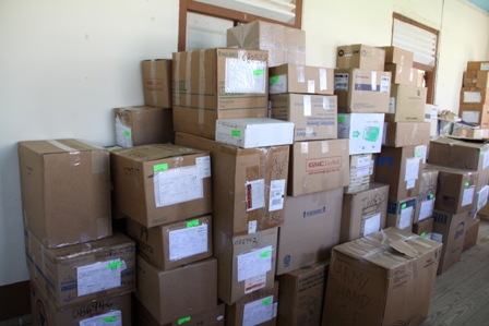Some of the unloaded medical supplies for the Alexandra Hospital in storage