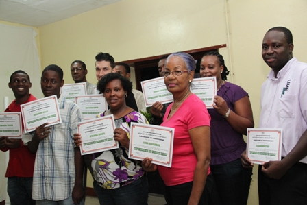 Participants of the Ministry of Social Development’s Basic Plumbing Installation Course showing off their Certificates of Achievement after successful completion