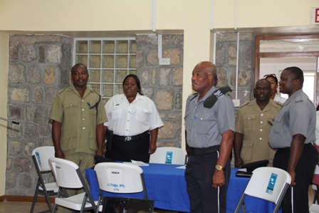 More Police Officers stationed in the Royal St. Christopher and Nevis Police Force Nevis Division singing the National Anthem at the start of the Programme