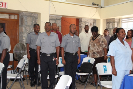 Police Officers stationed in the Royal St. Christopher and Nevis Police Force Nevis Division singing the National Anthem at the start of the Programme