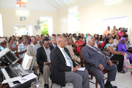 Front row (L-R) Premier of Nevis Hon Joseph Parry and Governor General of St. Kitts and Nevis His Excellency Sir Cuthbert Sebastian were among those present at the 100th Birthday Celebratory Service for Ms. Celian “Martin” Powell on January 19th at the New River Methodist Church