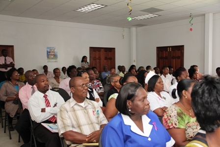 A section of the packed hall of attendees at the Oncology Symposium hosted by the Ministry of Health in conjunction with Pink Lily Cancer Care at the St. Pauls Anglican Church Hall
