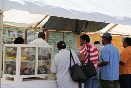Members of the Nevis public patronise the Abattoir’s stall at the 18th annual Department of Agriculture Open Day at the Villa Grounds in Charlestown