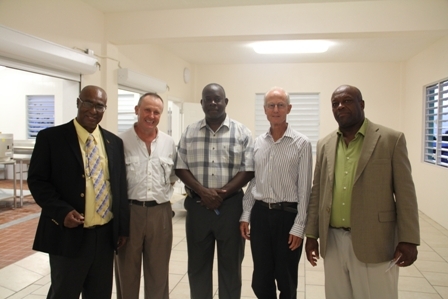 (L-R) Premier of Nevis Hon. Joseph Parry, Executive Chief and advisor for nutrition and menus in the Private Initiative for School Lunches group Mr. Mark Roberts, Area representative for the St. Pauls Parish Hon. Robelto Hector, lead members in the Private Initiative for School Lunches group Mr. James Gaskell and Mr. Hastings Daniel during a tour of the new Charlestown Primary School Cafeteria