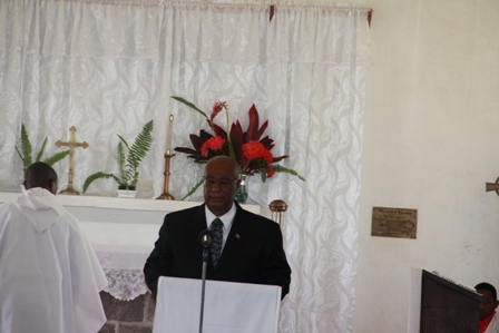 Premier of Nevis, Hon. J. Parry delivering a tribute during the funeral