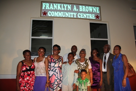 Mr. Brown and his wife Lorraine savour the moment with family their family moments after they unveiled the new name of the community centre at Combermere