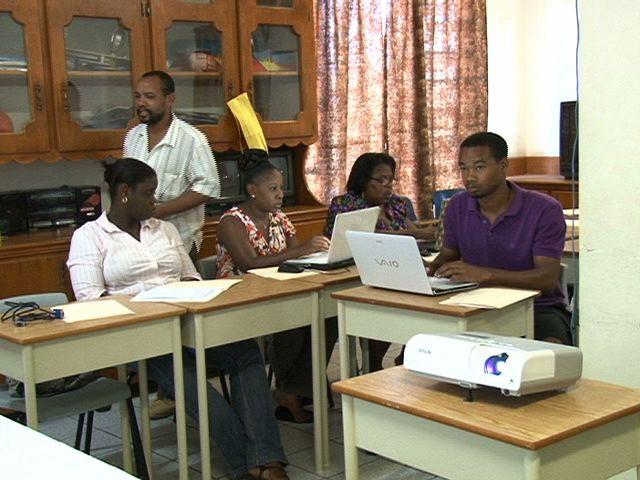 Technical and Vocational Education Training (TVET) workshop facilitator and Principal TVET Officer in St. Kitts Mr. Fitzroy Wilkin with some of the participants at the Technical and Vocational Education Training workshop at Marion Heights