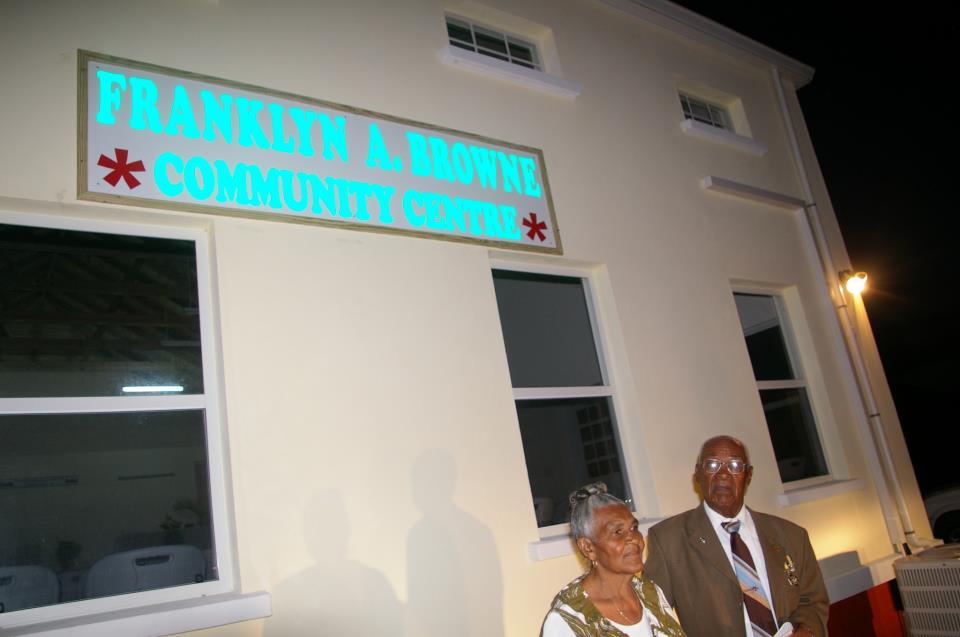 Mr. Franklin A. Browne and his wife Lorraine in front of the newly named community center