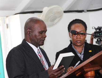 New President of the Nevis Island Assembly Hon. Farrel Smithen takes his oath at the Nevis Island Assembly Chambers at Hamilton House on March 26, 2013