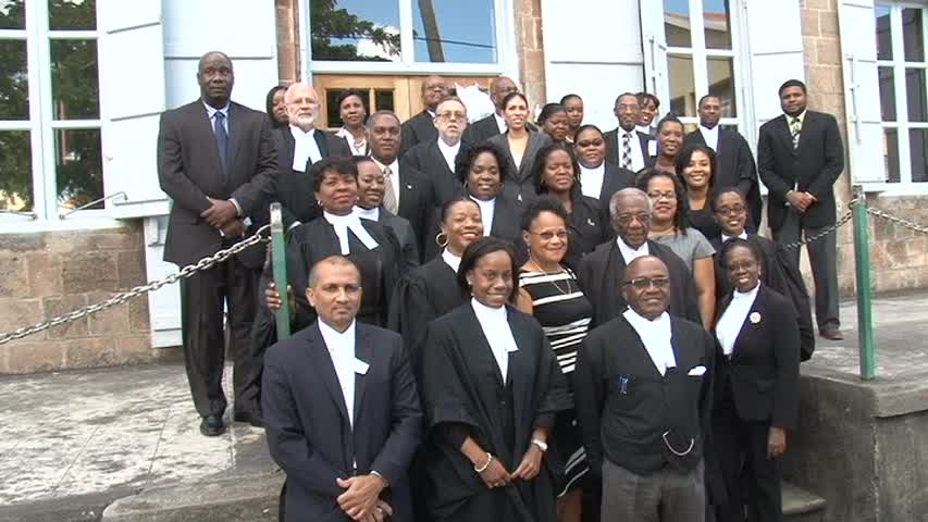 Senior Lawyer on Nevis Mr. Theodore Hobson QC after a special sitting of the High Court in Nevis in honour of the 50 year since his admittance to the Bar in St. Christopher and Nevis in November 1963 surrounded by colleagues: senior and junior and family members outside the High Court