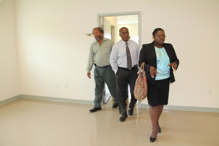 Premier of Nevis (middle), Hon. Hazel Brandy-Williams and Director of the Nevis Disaster Management Department Mr. Lester Blackette touring the state-of-the-art Emergency Operating Centre