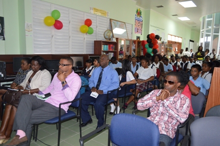 A section of persons present including Deputy Premier of Nevis Hon. Mark Brantley (third from right) at the unveiling of the Charlestown Secondary School Library and Media Centre’s Hall of Fame on February 07, 2014