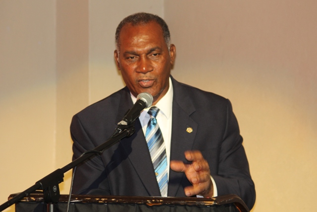 Premier of Nevis and Minister of Education Hon. Vance Amory delivering remarks at the Bank of Nevis Ltd. Tourism Youth Congress on May 08, 2014 at the Nevis Performing Arts Centre.