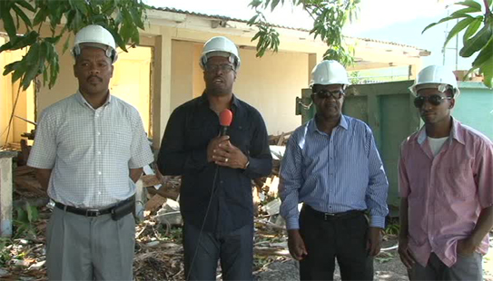 (L-R) Hospital Administrator Gary Pemberton, Deputy Premier of Nevis and Minister of Health Hon. Mark Brantley, Assistant Administrator Johnson Morton and Lefco Lefco Equipment Rental and Construction Co. Ltd. representative Randy Taylor at the start of demolition works of the old Nurse’s Home at the Alexandra Hospital on June 20, 2014