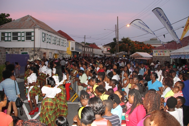 Participants for the Culturama 40 Miss Culture Queen Pageant, the Miss Culture Swimwear and Mr. Kool contests mingle with members of the public after they were officially launched in Charlestown on June 13, 2014