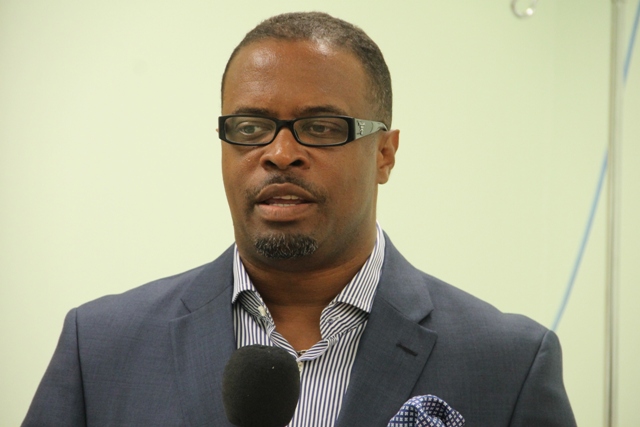 Deputy Premier of Nevis and Minister of Health Hon. Mark Brantley at a welcoming ceremony for Georgia-based Cardiologist/Internist at the Alexandra Hospital on July 07, 2014