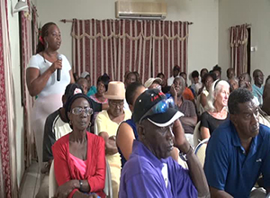 A section of those in attendance at a town hall meeting hosted by the Nevis Island Administration in Charlestown at the Red Cross conference room on August 14, 2014