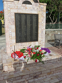 The Christena Disaster Memorial erected on the Charlestown Waterfront with wreaths at the end of a Memorial Service on August 01, 2014, to mark the 44th anniversary of the disaster in which 233 persons perished