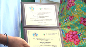 Plaques for two fallen Anguillan drag racing enthusiasts honoured by the Nevis Island Administration’s Drag Racing Unit