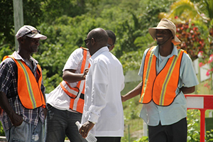 Prime Minister of St. Kitts and Nevis the Rt. Hon. Dr. Denzil Douglas talking to workers in the Nevis Water Supply Enhancement Project on October 08, 2014