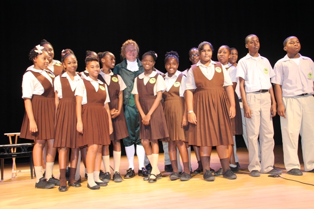 Second Form students from the Charlestown Secondary School with world renowned Alexander impersonator Dr. William Bill Chrystal after his performance at the Nevis Performing Arts Centre on Monday, November 24, 2014