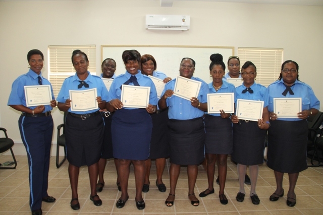 Graduands of the Royal St.Christopher and Nevis Police Force Traffic Wardens Training Course at the closing ceremony on December 5th, 2014, at the Cotton Ground Police Station