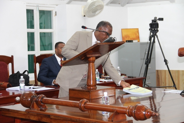 Premier of Nevis and Minister of Finance Nevis Island Administration Hon. Vance Amory tables The Draft Estimates 2015 at the Nevis Island Assembly sitting on December 16, 2014