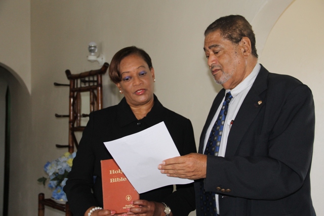 New Resident Judge for the Nevis High Court, Nevis Circuit Justice Lorraine Williams takes her oath before Deputy Governor General His Honour Eustace John at his Bath Plain Office on January 12, 2015