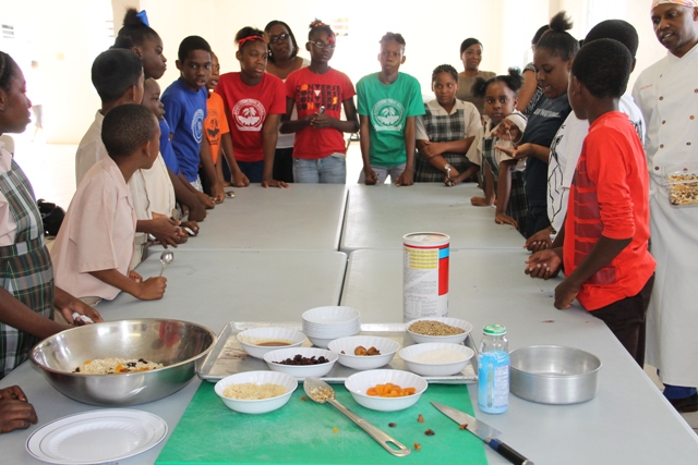 Students of the Charlestown Primary School participating in a Mini Chef Academy at the school’s kitchen on February 24, 2015, hosted by the Rouse Foundation, in collaboration with the Nevis Island Administration