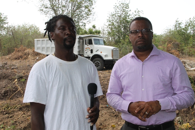 (L-R) Managing Director of DC Equipment and Stoney Grove resident Dale Claxton and Deputy Premier of Nevis Hon Mark Brantley on site at the Upper Stoney Grove ghaut on Friday 8th May, 2015