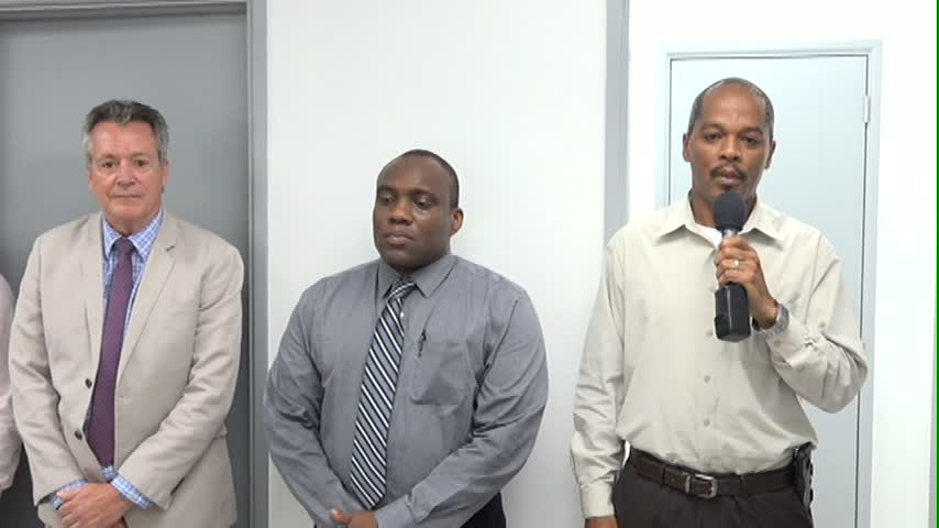 (L-R) Dean of Basic Science at the Medical University of the Americas Ralph Crum, Obstetrics and Gynaecology specialist Dr. John Essien and Hospital Administrator Gary Pemberton at the handing over ceremony at the Alexandra Hospital on June 12, 2015