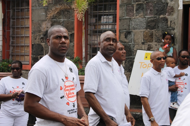 (L-R) Deputy Prime Minister and Minister of Education in St. Kitts Hon. Shawn Richards, Cabinet Secretary Mr. Stedmond Tross, Premier of Nevis and Minister of Education Hon. Vance Amory and Legal Advisor Colin Tyrell at the annual Child Month Parade in Charlestown on June 15, 2015