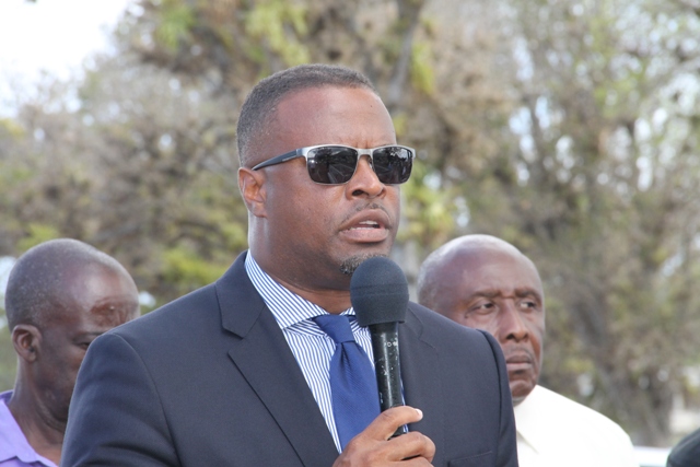 Deputy Premier of Nevis Hon. Mark Brantley delivering remarks at a memorial service for the late Malcolm Guishard at the Bath Cemetery on June 11, 2015