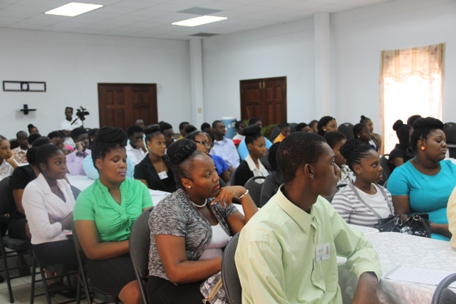 Participants in the Department of Youth and Sports Summer Job Attachment Programme at the opening ceremony at the St. Paul’s Anglican Church Hall on June 29, 2015