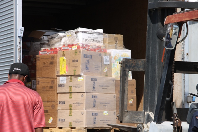 One of several pallets of non-perishable items among the relief supplies donated by the Four Seasons Resort, Nevis and its staff delivered at the Long Point Port on September 07, 2015 ahead of shipment to the to the Commonwealth of Dominica