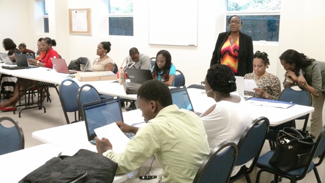 Some of the participants at a two-week Quick Books Accounting training session for small business owners with facilitator Alexa Pemberton (standing),  hosted by the Ministry of Finance in conjunction with the Small Enterprise Development Unit at the Nevis Department Disaster Management conference room at Long Point on October 23, 2015