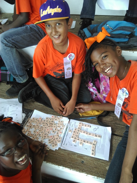Students from the Charlestown Primary School at the Elquemedo T. Willett Park at the first Rainforest of Reading Book Festival in Nevis on November 06, 2015
