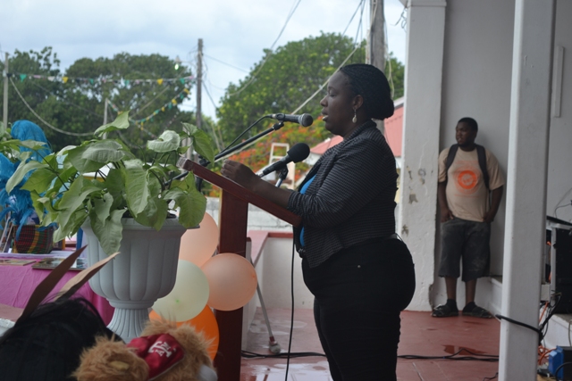 Education Officer responsible for Literacy Development at the Department of Education Terres Dore delivering remarks at the start of the first Rainforest of Reading Book Festival at the Elquemedo T. Willett Park on November 06, 2015