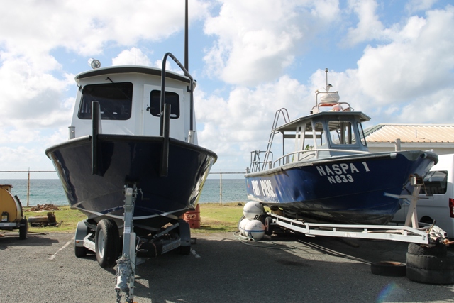 The older patrol vessel (right), sitting next to the new vessel at the Long Point Port, is available for sale by the Nevis Air and Sea Ports Authority 