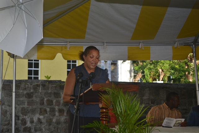 Tracy Parris Coordinator of the Alexander Hamilton Fund and Community Development Officer in the Department of Community Development on Nevis delivering a report on the status of the Fund at the annual Alexander Hamilton Scholarship Award Ceremony on January 08, 2016, at the grounds of the Alexander Hamilton Museum in Charlestown