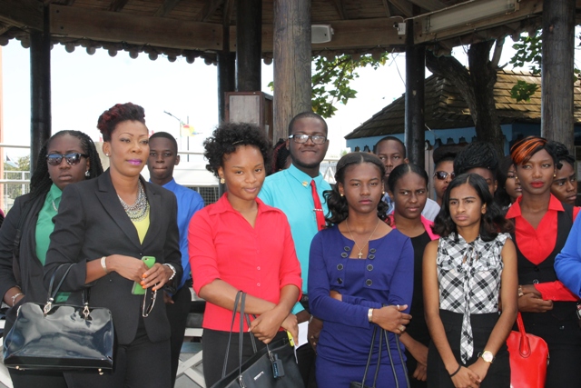 Ms. Camara Lee, Chair of the Nevis Island Youth Council’s Steering Committee leading a group of Nevis youths at the Charlestown Pier on April 04, 2016, moments before their departure for St. Kitts to attend a forum as part of Diplomatic Week 2016