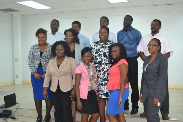 Participants of the Caribbean Development Bank funded training workshop hosted by Small Enterprise Development Unit at the St. Paul’s Anglican Church Hall on April 14, 2016, with Permanent Secretary in the Ministry of Finance Colin Dore (top row extreme left) and Facilitators Nicole Liburd (second row second from left) and Catherine Forbes  (front row extreme right)