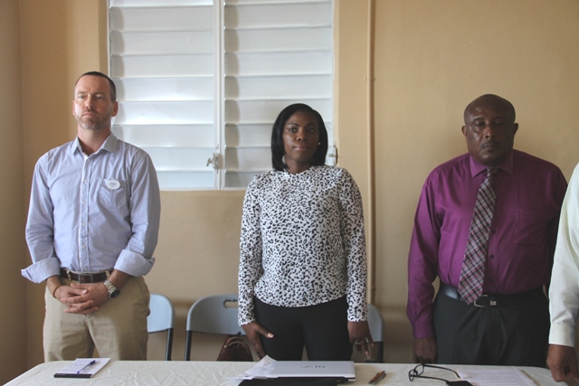 Facilitator of the Gingerland Community-Based Tourism Workshop Mr. James Crockett, Tourism Specialist at the Organisation of the Eastern Caribbean States Commission Tourism Desk, Dr. Lorraine Nicholas, and Permanent Secretary in the Ministry of Tourism Carl Williams at the workshop’s opening ceremony on June 27, 2016, at the Hardtimes Conference Centre in Gingerland