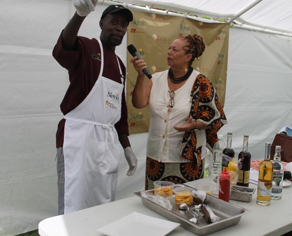 Local chef Llewellyn Clarke preparing to demonstrate his creation, Nevisian Mango Ice-cream with a Mango Coulis, drizzled with Brinley Gold Mango Rum infused with vanilla at the Nevisian Chefs Mango Feast at Oualie Beach during the third annual Nevis Mango and Food Festival