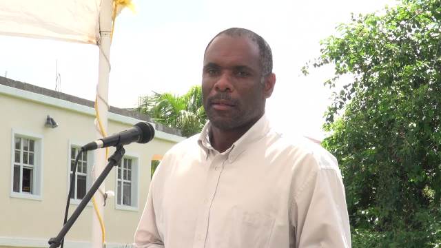 Permanent Secretary in the Ministry of Finance on Nevis Colin Dore delivering remarks at the unveiling of the Inland Revenue Department’s state-of-the-art bus stand on the Island Main Road near Horsford’s Valu Mart unveiled by the Inland Revenue Department  on Nevis on August 12, 2016