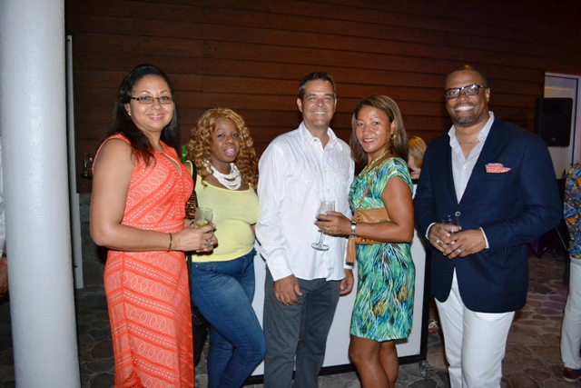 Deputy Premier of Nevis and Minister of Tourism Hon. Mark Brantley (extreme right) and Mrs. Brantley (extreme left) with Gary Colt, member of the Nevis Tourism Authority Board of Directors (third from left) and invitees at a cocktail reception held by the Premier’s Ministry for participants at the annual Nevis Travel Symposium of Romance hosted by the Nevis Tourism Authority at the Four Seasons Resort on October 17, 2016