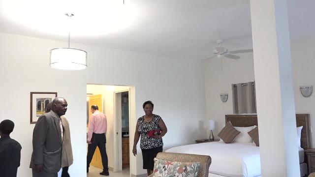 Invited guests tour one of the new at the new wing of the Mount Nevis Hotel on October 14, 2016