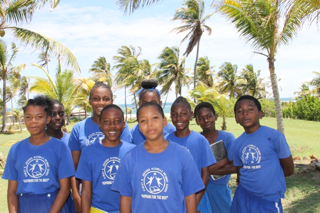 (Front) Hujay Jeffers, Grade 6 student of the Violet O. Jeffers Nicholls Primary School and fellow students at the Nisbet Plantation Beach Club on May 04, 2017, as part of the Ministry of Tourism’s Hospitality Immersion exercise