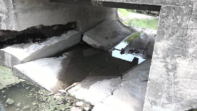 A close-up of severe damage to Bath Bridge on May 15, 2017, after recent heavy rains